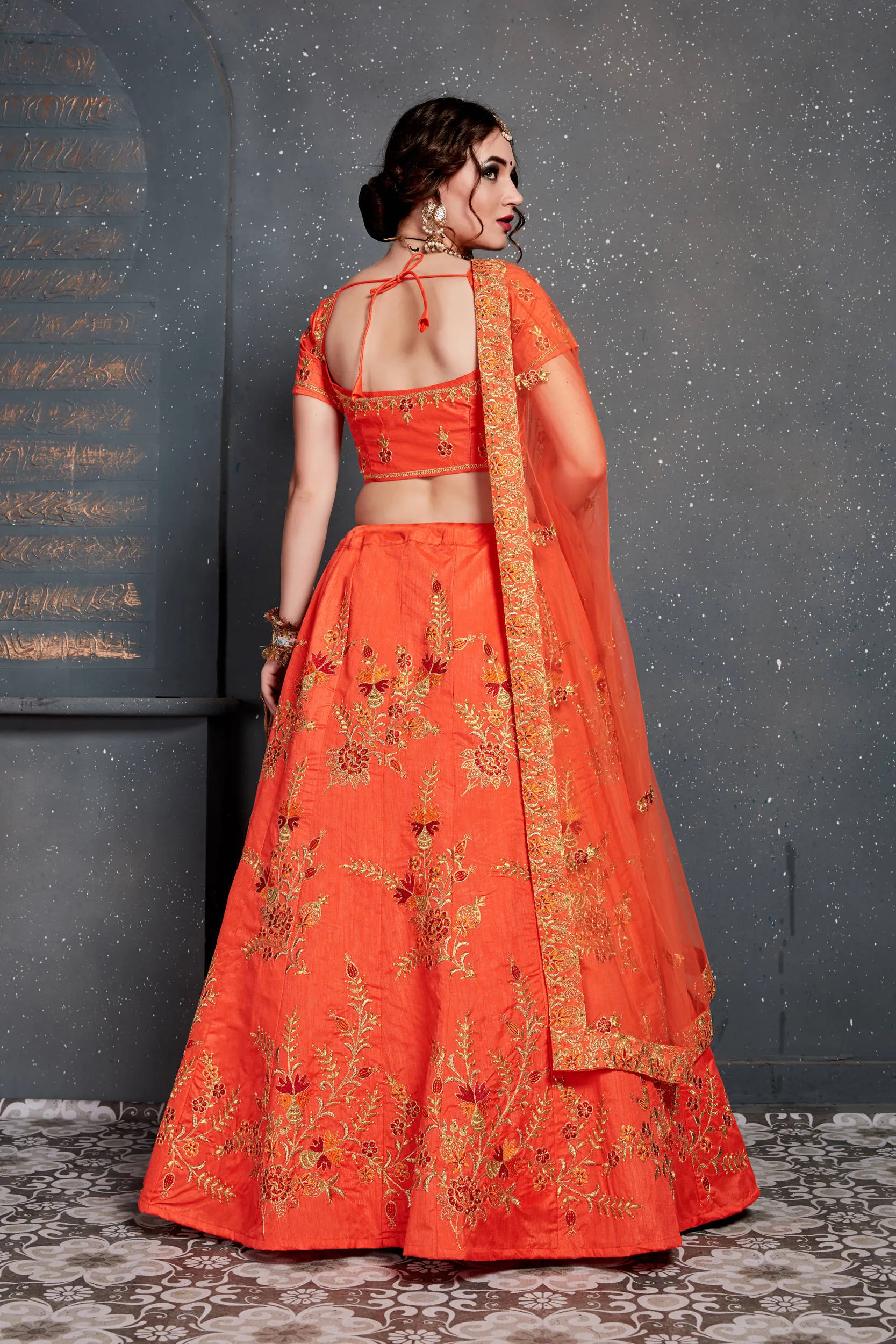 Hypnotic Orange Colored Slub Silk Lehenga Choli